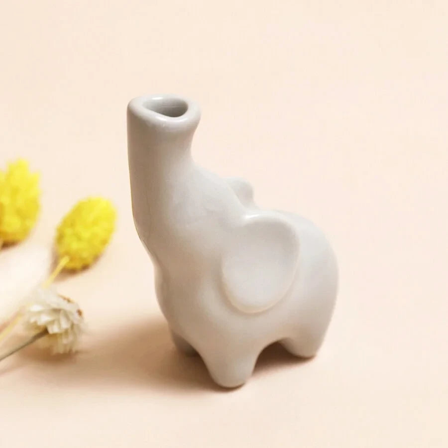 Adorable Tiny cream coloured elephant vase
