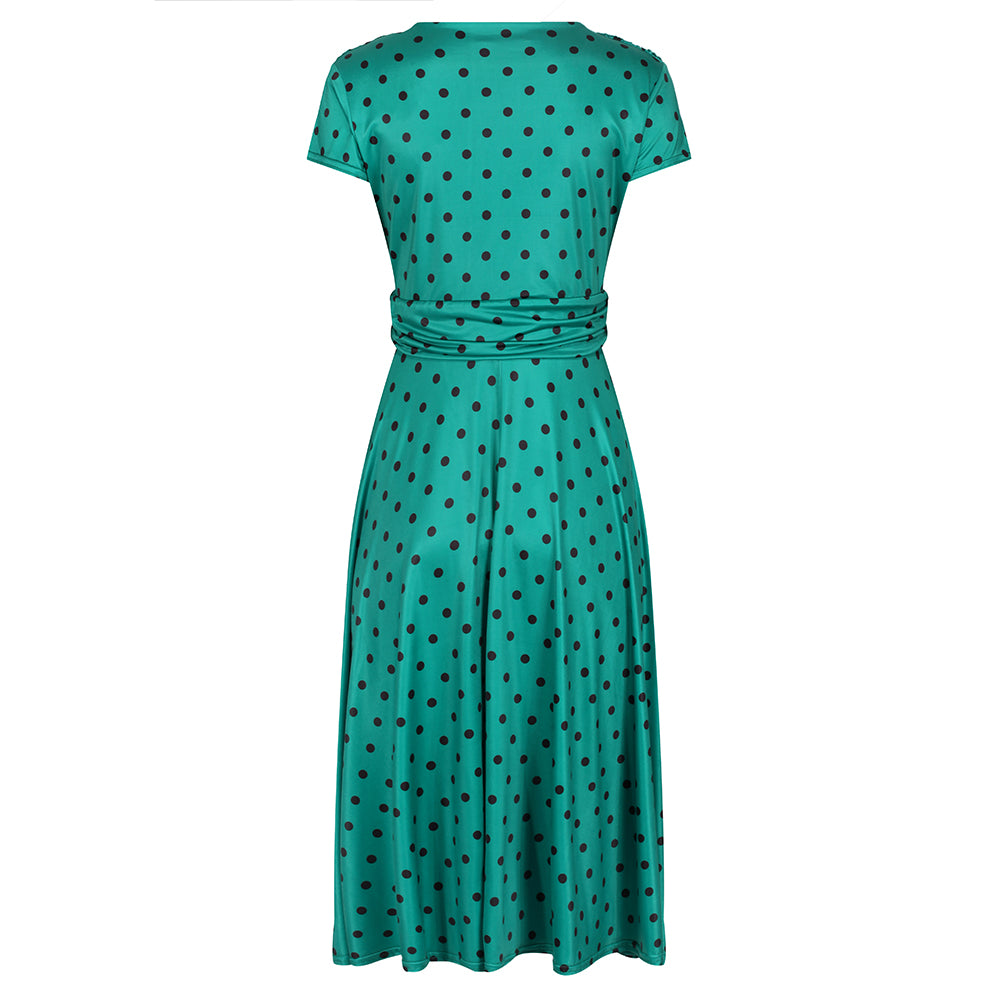 Green dress with outlet black spots