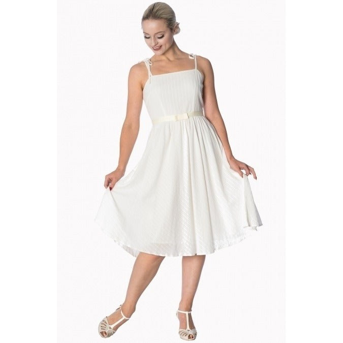 Dress with small shoulder straps worn in outlet summer